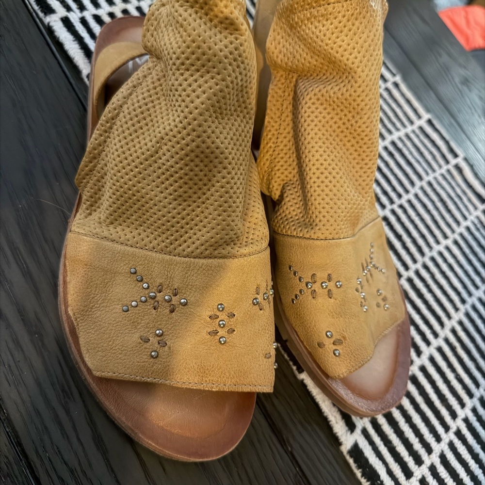Miz Mooz Fifi leather ankle-strap sandals in a wheat color.